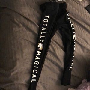 Girls 5/6 black pants..”totally magical” on both legs with a unicorn